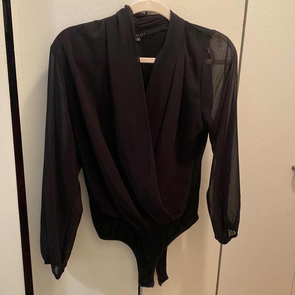 Trendy black leotard with sheer sleeves